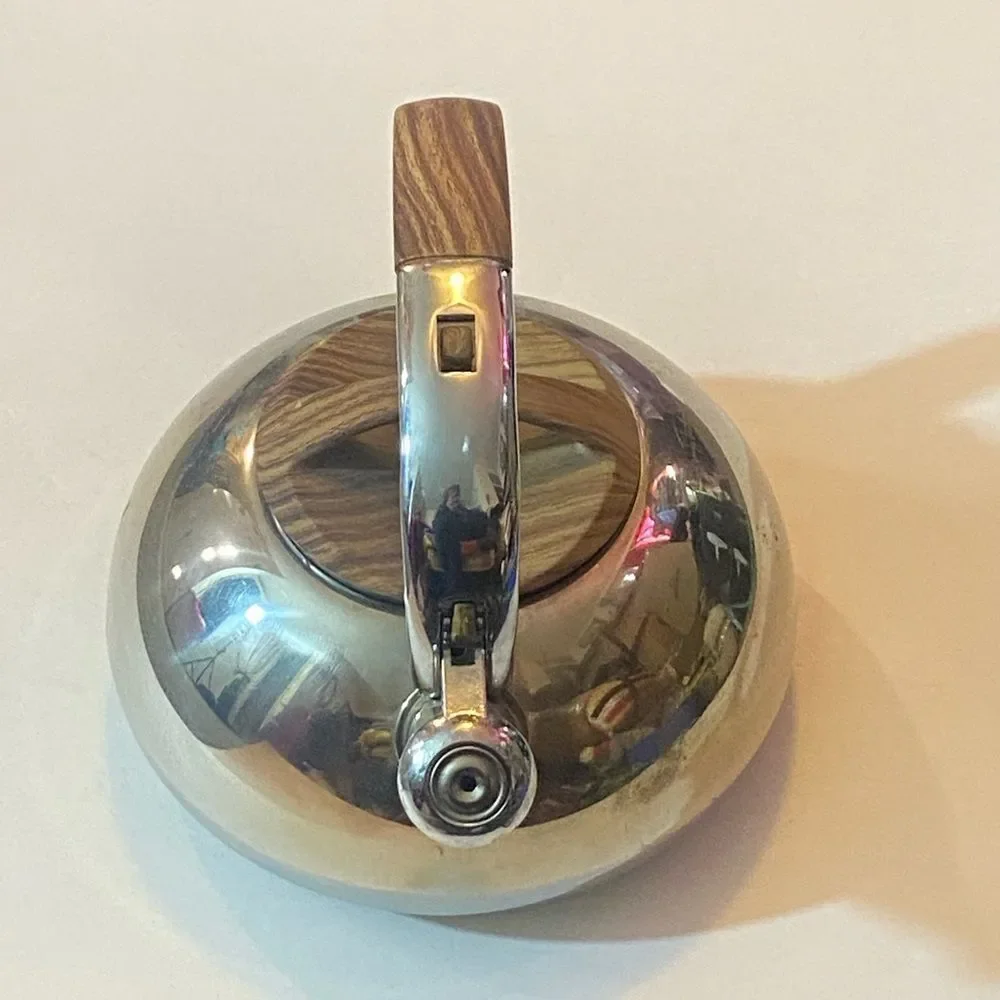 Polished Silver Kettle with Wooden Accents